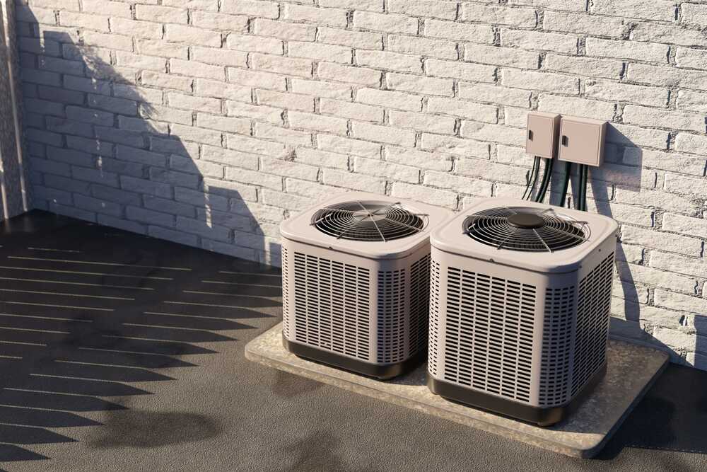 two outdoor ac condenser units